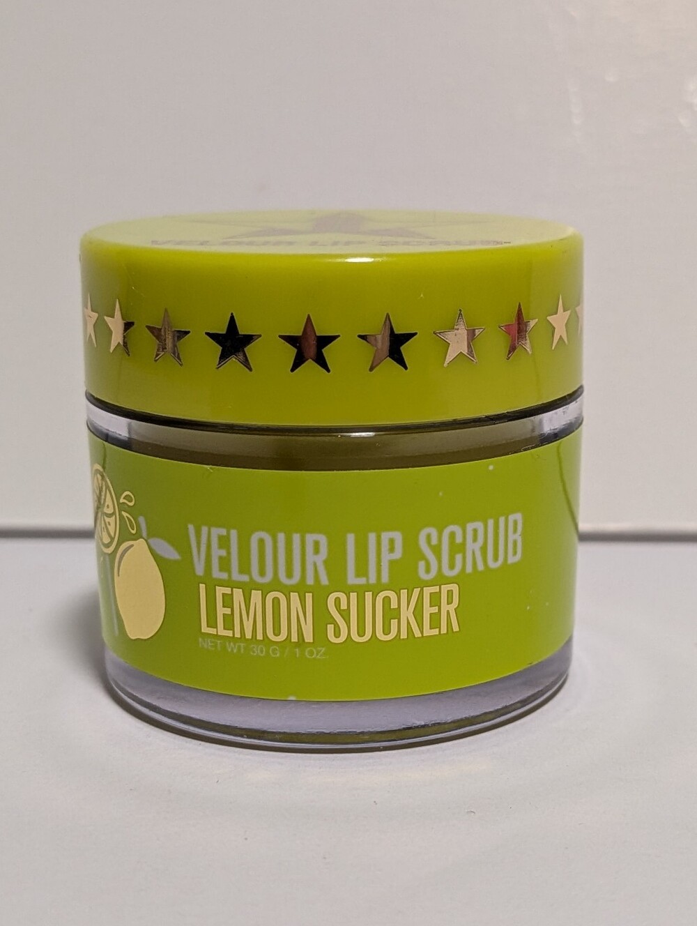 Jeffree Star Velour Lip Scrub in the "Lemon Sucker" flavor, featuring a vibrant